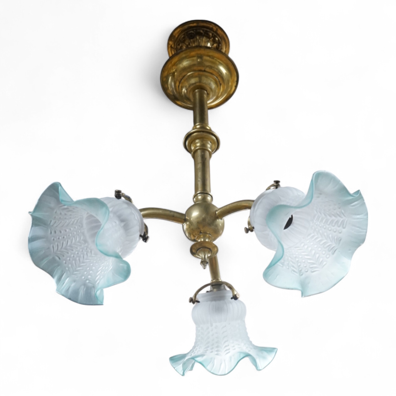 A brass three branch frosted shade ceiling light